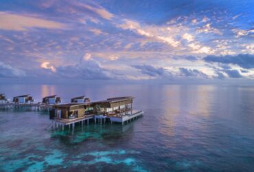 THE-Overwater-Reef-Residence-Aerial-View-Sunset